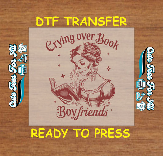 Skeleton woman crying while reading a book, vintage gothic DTF transfer.