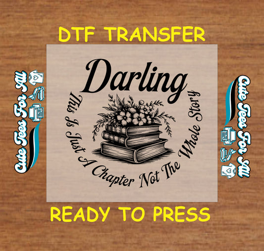 Black and white DTF transfer with book stack, flowers, and the quote “Darling, This Is Just A Chapter Not The Whole Story”