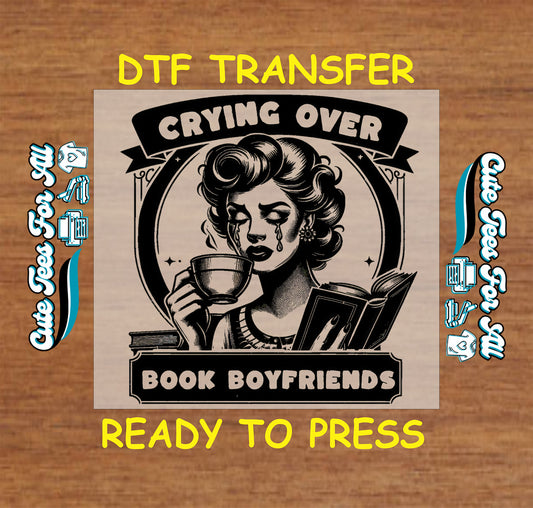 Vintage-style woman crying while holding a cup and reading a book, text says "Crying Over Book Boyfriends"