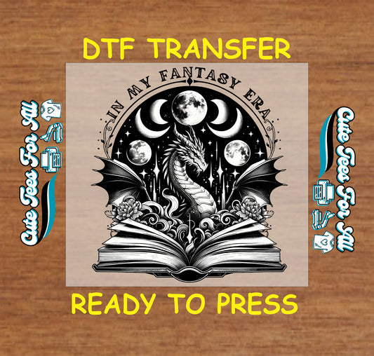Dragon rising from an open book with moon phases in the background, text says "In My Fantasy Era"