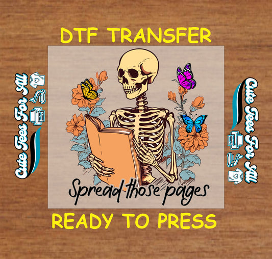 Skeleton holding an orange book with colorful flowers, butterflies, and the phrase "Spread Those Pages"