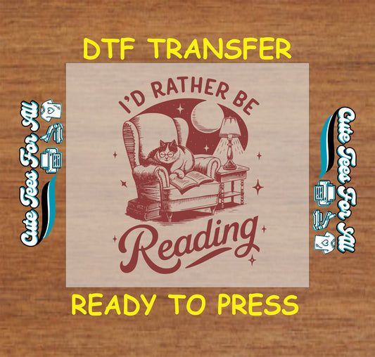 DTF transfer of cat in armchair with “I’d Rather Be Reading” text