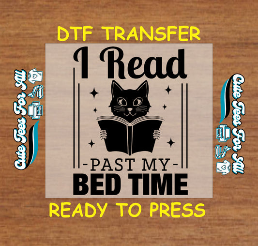 Black cat holding an open book with the phrase "I Read Past My Bed Time" in bold lettering.