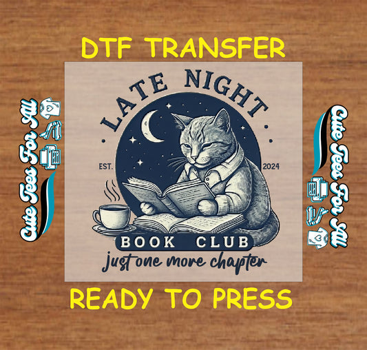 DTF transfer with cat in sweater reading under moon with coffee and books, “Late Night Book Club” text.