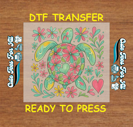 DTF transfer of sea turtle made of pink, green, and yellow flowers with hearts and tropical leaves.