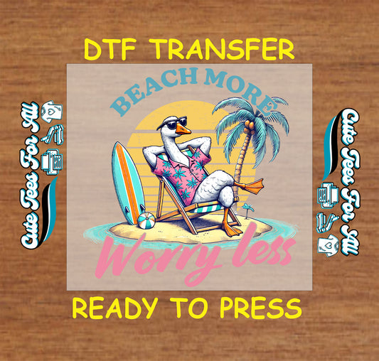 DTF transfer with seagull in chair, palm tree, surfboard, and text “Beach More Worry Less”