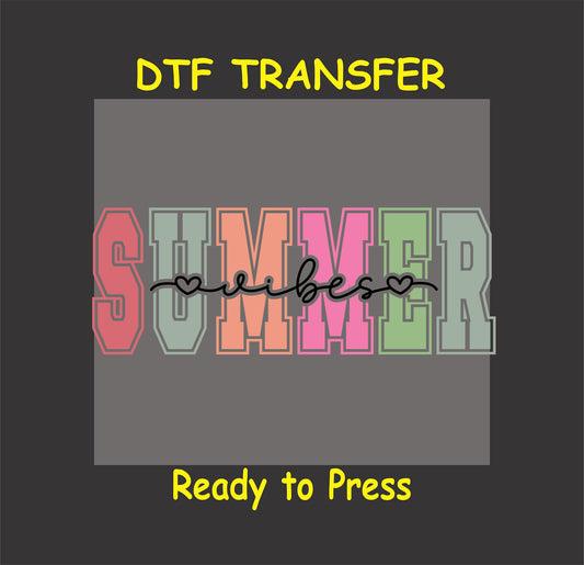 DTF transfer with multicolor block letters spelling “SUMMER” and black script “vibes” overlay.