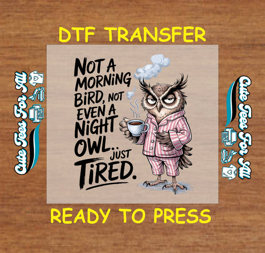 Grumpy cartoon owl in pajamas holding coffee with "just tired" quote.