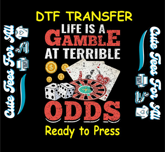 DTF transfer with roulette wheel, dice, cards, coins, and “Life is a Gamble at Terrible Odds” text.