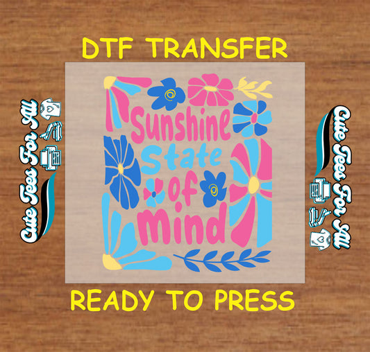 DTF transfer with pink and blue retro flowers and Sunshine State of Mind quote.
