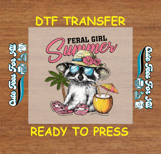 DTF transfer with raccoon in hat and sunglasses, holding a coconut drink with text "Feral Girl Summer"