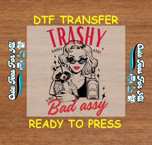 DTF transfer with retro woman, raccoon, liquor bottle, and Trashy Sassy Bad A**y quote.