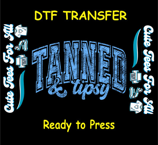 DTF transfer with distressed blue Tanned and Tipsy text on black background.