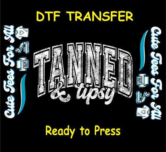 DTF transfer with distressed white Tanned and Tipsy text on black background.