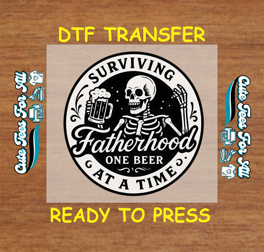 DTF transfer with skeleton holding a beer and text Surviving Fatherhood One Beer at a Time.
