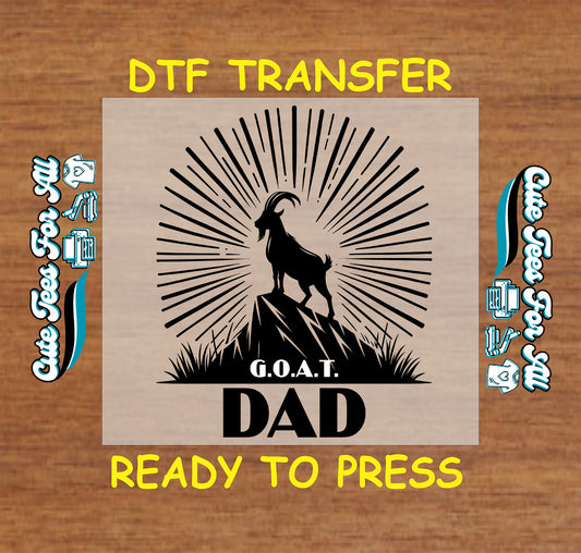 Silhouette of goat standing on mountain with sunburst rays and text G.O.A.T. Dad.
