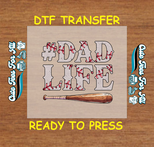 #DadLife DTF transfer with red baseball stitching and wooden bat below bold text.
