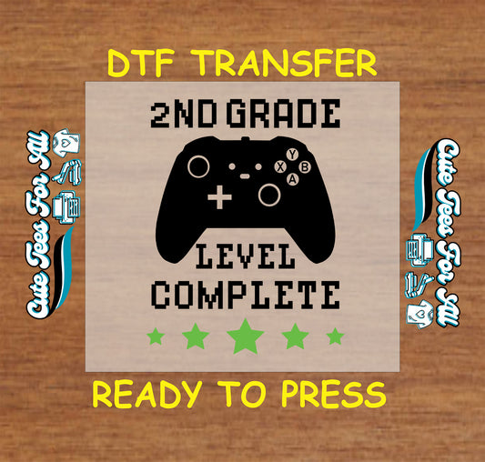 2nd Grade Level Complete DTF transfer with black Xbox-style controller and green stars.