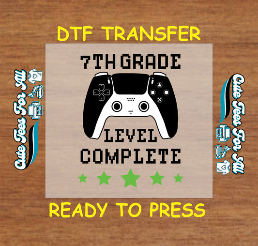 7th grade level complete DTF transfer with black gaming controller and pixel text.