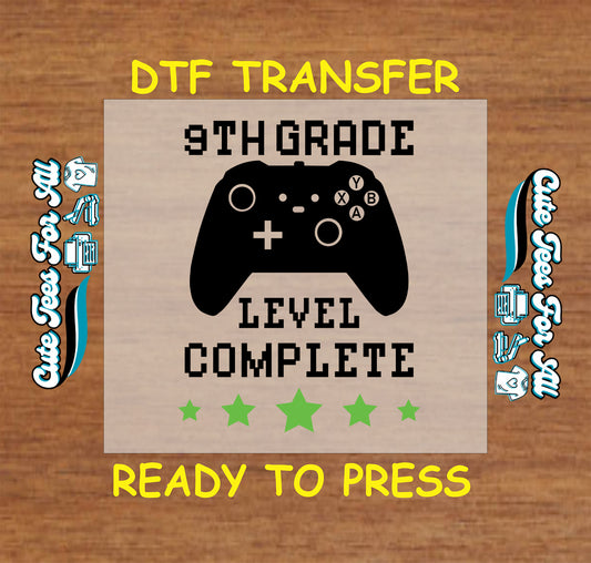 9th grade level complete DTF transfer with black game controller and stars.