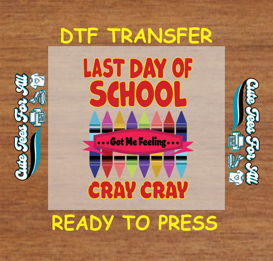 DTF transfer with “Last Day of School Got Me Feeling Cray Cray” text, rainbow crayons, and red banner.