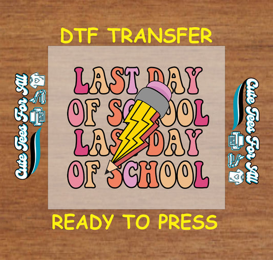 DTF transfer with repeated “Last Day of School” text and lightning pencil over retro bubble letters.