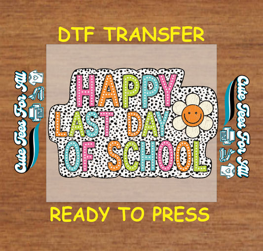 DTF transfer with “Happy Last Day of School” colorful letters, polka dot background, and smiley flower.