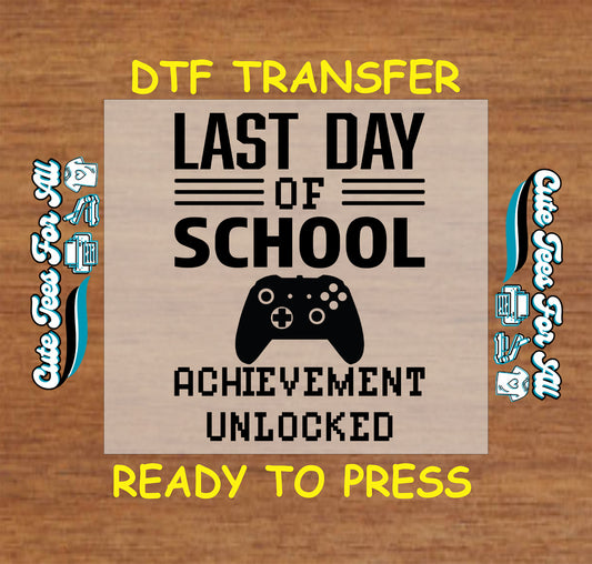 DTF transfer with “Last Day of School Achievement Unlocked” text and video game controller graphic.