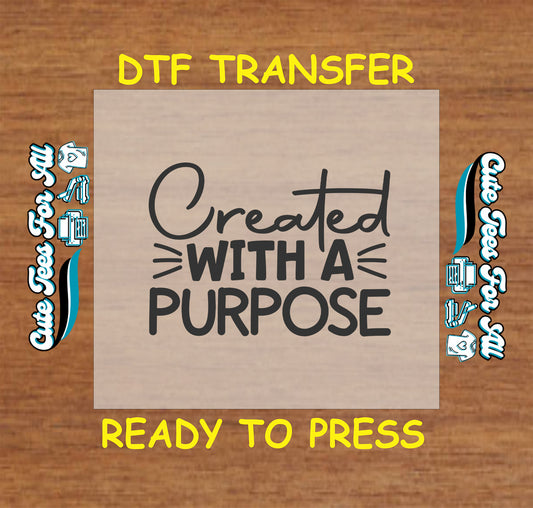 DTF transfer with the phrase “Created With a Purpose” in modern black lettering with line accents.
