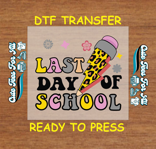DTF transfer with “Last Day of School” text, cheetah print pencil, and colorful flowers.