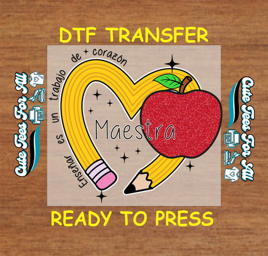 Yellow heart pencil with glitter apple and Maestra text in Spanish.