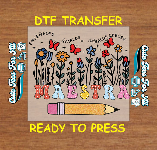 DTF transfer with “Maestra” in pastel letters, pencil base, flowers, butterflies, and Spanish phrases above.