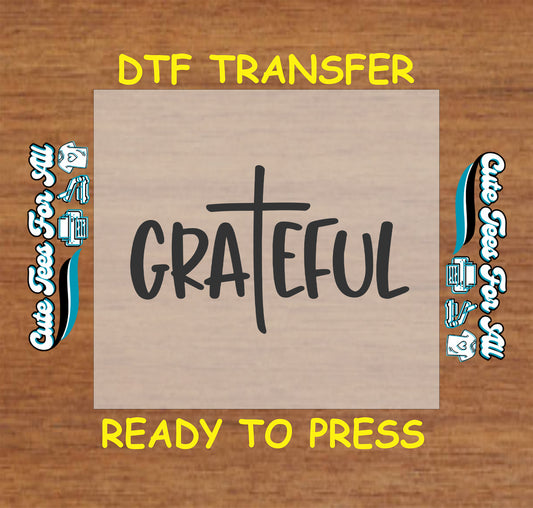 DTF transfer with the word “Grateful” and a cross replacing the letter T.