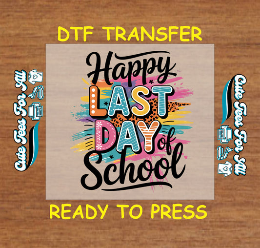 DTF transfer with “Happy Last Day of School” in colorful block letters and paint splashes.