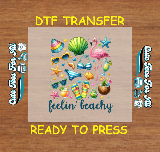 Feelin' Beachy DTF with flamingo, seashells, sunglasses, flip-flops, and drinks.