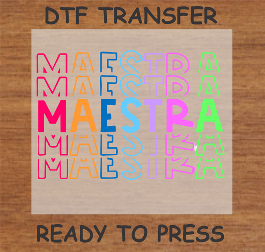 Colorful stacked 'Maestra' text DTF transfer, ready to press.