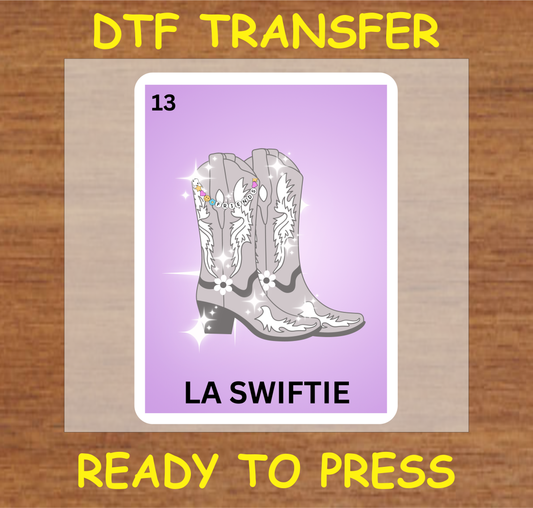 DTF transfer design featuring 'La Swiftie' from Lotería-inspired art, showing stylish cowboy boots with beaded accessories.