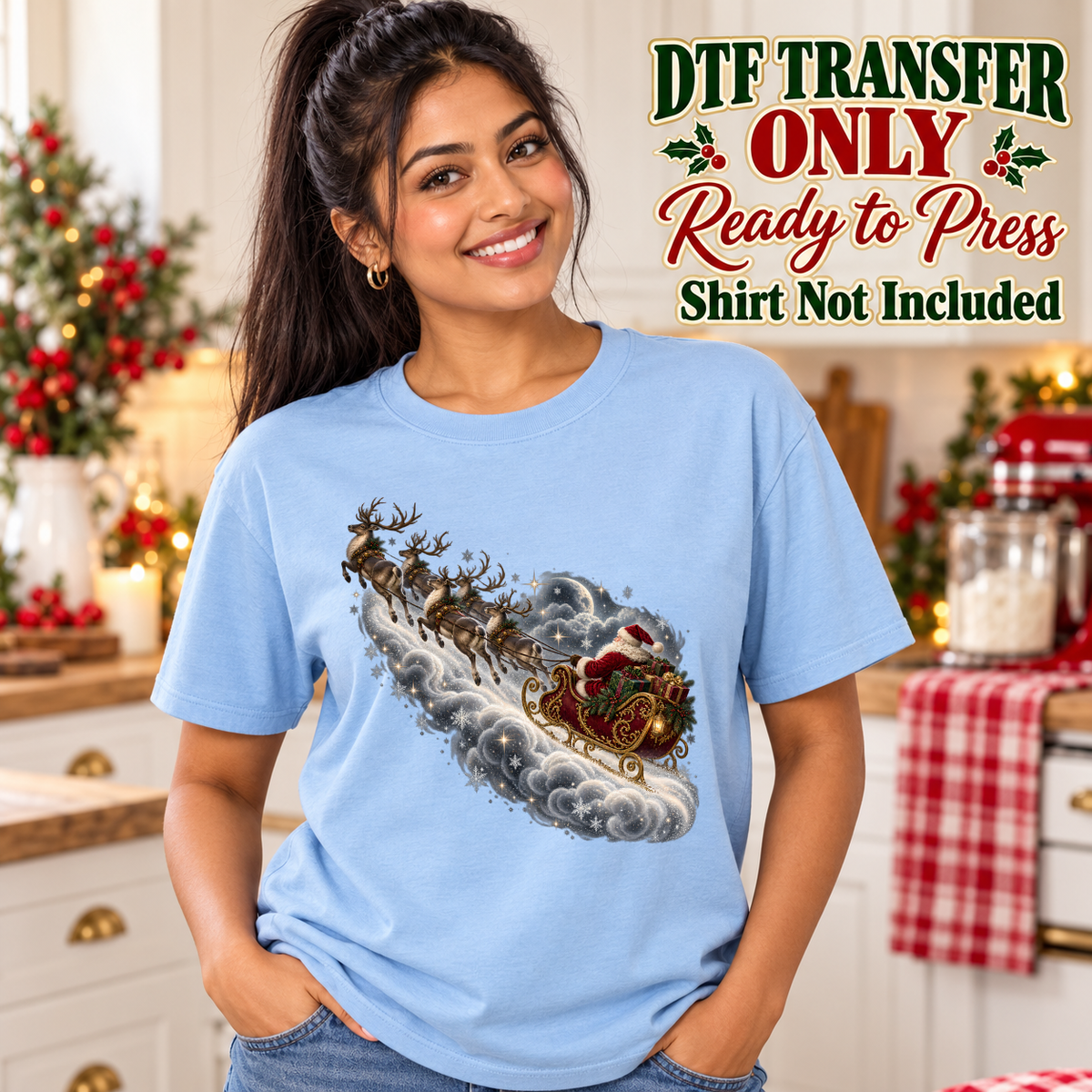 Christmas Santa Sleigh Moonlight design shown on a light blue shirt worn by a model; DTF transfer only, shirt not included.