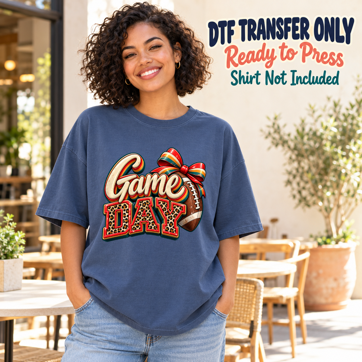 Football Game Day Red Bow design shown on a navy shirt worn by a model; DTF transfer only, shirt not included.