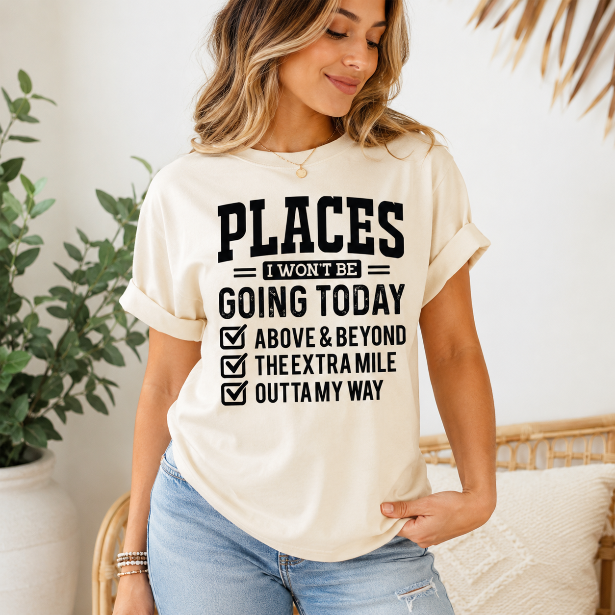 Lifestyle mockup of a cream shirt with a funny introvert ready to press dtf graphic that says Places I Won’t Be Going Today.