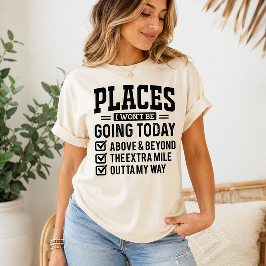 Lifestyle mockup of a cream shirt with a funny introvert ready to press dtf graphic that says Places I Won’t Be Going Today.
