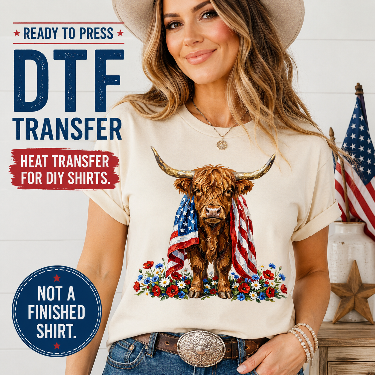 Fourth of July highland cow DTF transfer mockup on cream shirt with American flag draped over cow, red white blue flowers, and western patriotic design.