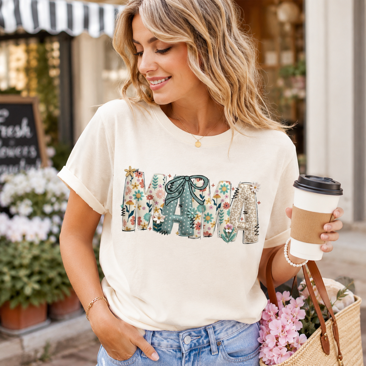 Cream shirt mockup featuring a floral patchwork MAMA ready to press dtf transfer with bow detail for cute mom shirts.