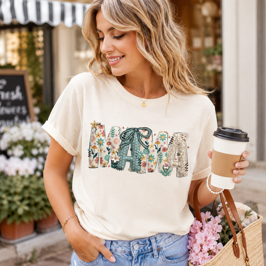 Cream shirt mockup featuring a floral patchwork MAMA ready to press dtf transfer with bow detail for cute mom shirts.