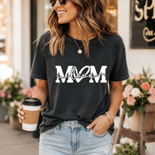 Black shirt mockup featuring a white MOM love ready to press dtf transfer for mom shirts, Mother’s Day apparel, and DIY shirts.