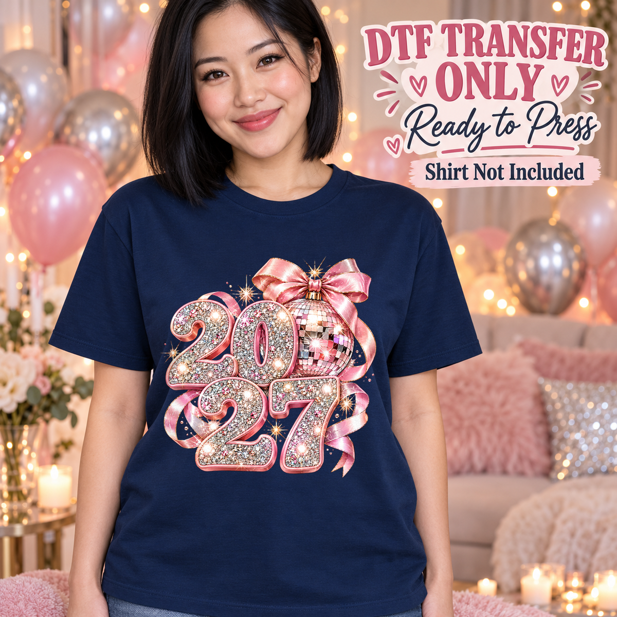 New Year 2027 Pink Disco Bow design shown on a navy shirt worn by a model; DTF transfer only, shirt not included.