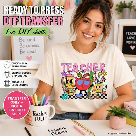 Woman wearing a 'Teacher' themed t-shirt with colorful graphics, holding a mug labeled 'Teacher Fuel', in a classroom setting.