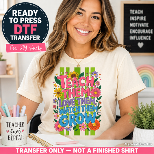 Woman wearing a t-shirt with colorful text and graphics, sitting at a desk with stationery items.